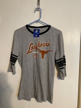 Kids' Longhorns Grey Raglan Long Sleeve Tee – Team Graphic
0002